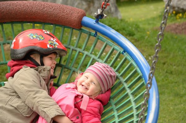 Good Neighbor Children in Swing