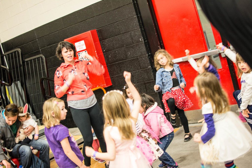 Albuquerque Moms Blog Easter Egg Hunt at Menaul School sponsored by Cornali & McDonald Orthodontic Specialists fitness class by Audra Powers