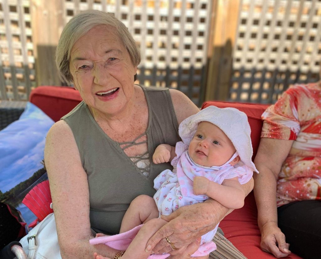 My grandmother holding my oldest daughter Jolene.